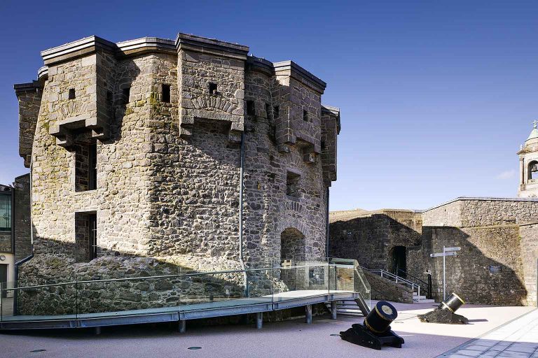 Athlone Castle Keep located in the courtyard of the castle grounds on a bright, sunny day.