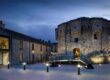 The old castle keep in the courtyard beautifully lit up on a dark evening at Athlone Castle Visitor Centre.