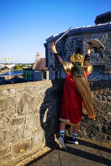A young king looks down upon the castle courtyard at Athlone Castle