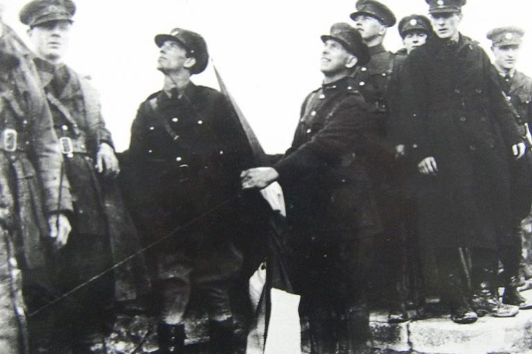 Irish soldiors raising the tricolor above Athlone Castle