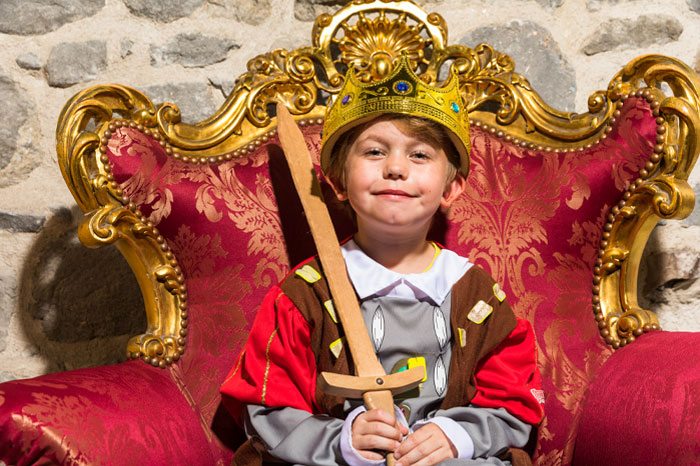 A young visitor sits on his throne as he becomes King of Athlone Castle